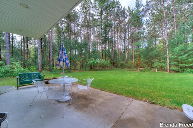 7561 Wiczer Dr, Whitehall, MI 49461 - view of patio featuring outdoor dining space