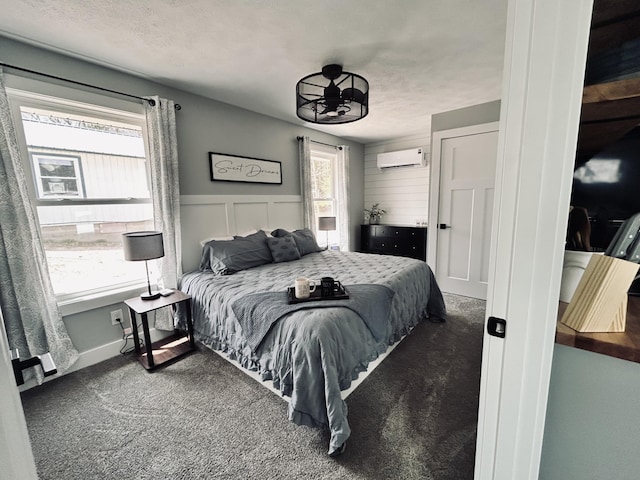 855 W Locust St, White Cloud, MI 49349 - carpeted bedroom featuring a wall unit AC and a wainscoted wall