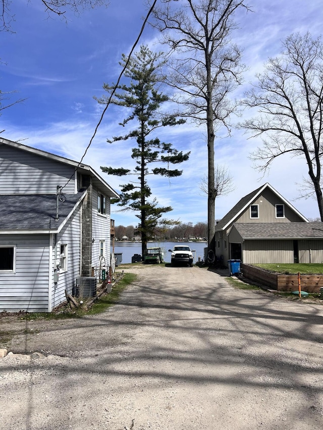 855 W Locust St, White Cloud, MI 49349 - view of dirt / gravel road with a water view