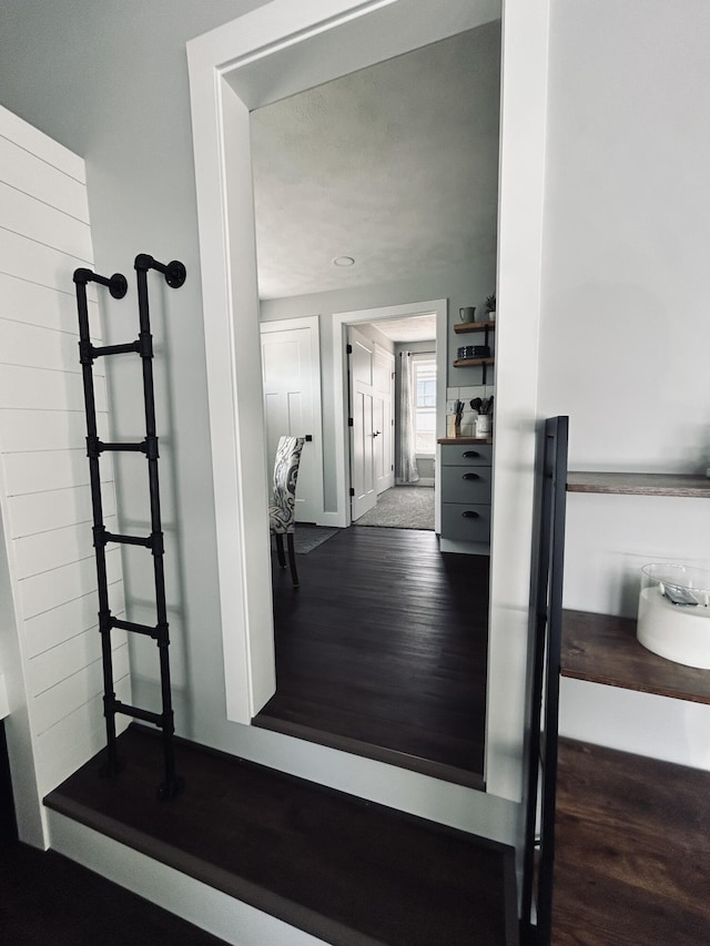 855 W Locust St, White Cloud, MI 49349 - hall with wood finished floors and baseboards