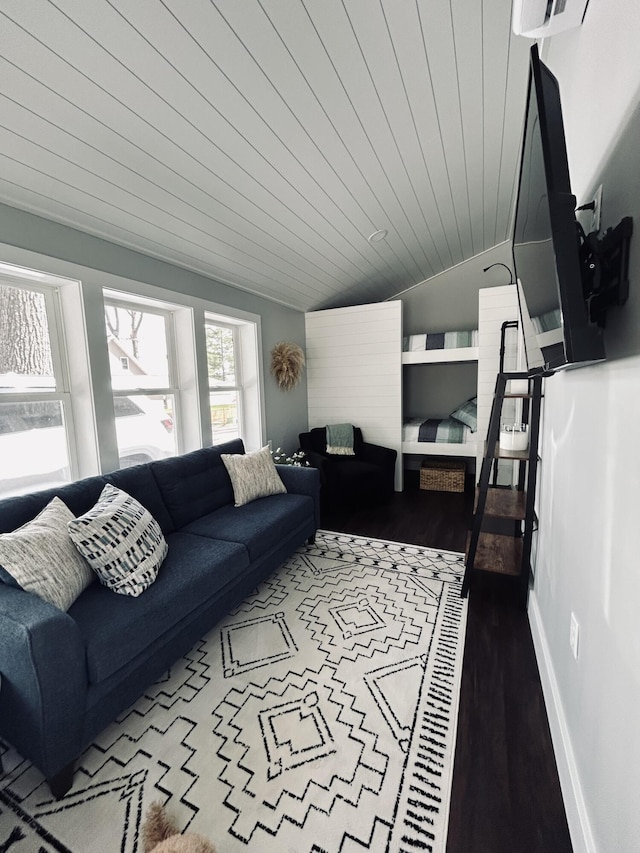 855 W Locust St, White Cloud, MI 49349 - living room featuring vaulted ceiling and wood finished floors