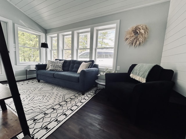 855 W Locust St, White Cloud, MI 49349 - living area featuring plenty of natural light, lofted ceiling, wood finished floors, and wooden ceiling