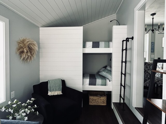 855 W Locust St, White Cloud, MI 49349 - bedroom with wooden ceiling and a chandelier