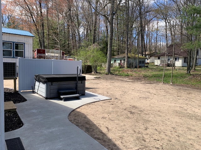 855 W Locust St, White Cloud, MI 49349 - view of yard featuring a hot tub