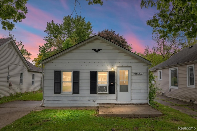 20515 Hollywood St, Harper Woods, MI 48225 - view of front of house featuring a patio area and a yard