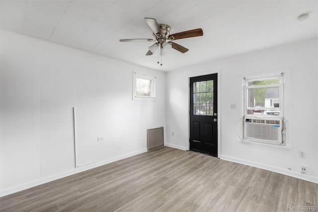 20515 Hollywood St, Harper Woods, MI 48225 - foyer entrance with wood finished floors, healthy amount of natural light, ceiling fan, and cooling unit