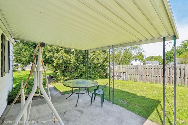 6008 Andersonville Rd, Waterford, MI 48329 - view of patio / terrace with outdoor dining space
