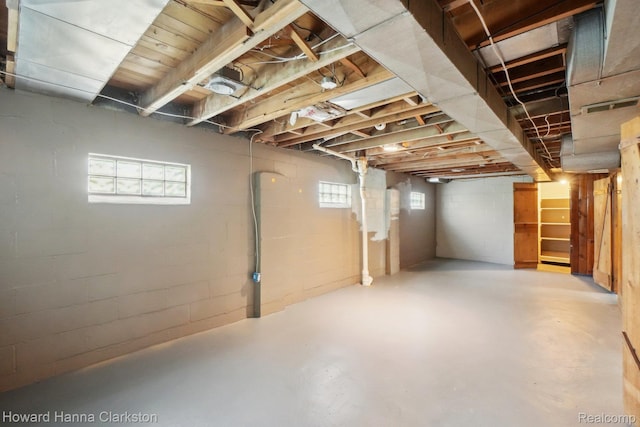 6008 Andersonville Rd, Waterford, MI 48329 - below grade area featuring concrete block wall