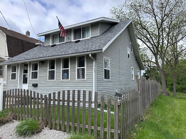 406 S Elm Ave, Jackson, MI 49203 - view of front of property with a shingled roof