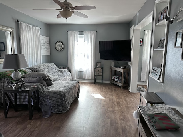406 S Elm Ave, Jackson, MI 49203 - living room featuring ceiling fan, wood finished floors, and baseboards