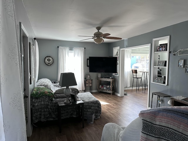 406 S Elm Ave, Jackson, MI 49203 - living area with plenty of natural light, ceiling fan, and wood finished floors