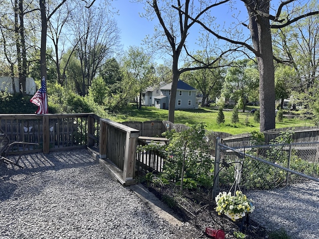 406 S Elm Ave, Jackson, MI 49203 - wooden deck featuring a fenced backyard