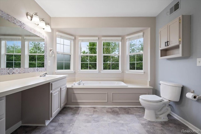 4632 Hunters Cir W, Canton, MI 48188 - bathroom with vanity, a garden tub, healthy amount of natural light, and toilet