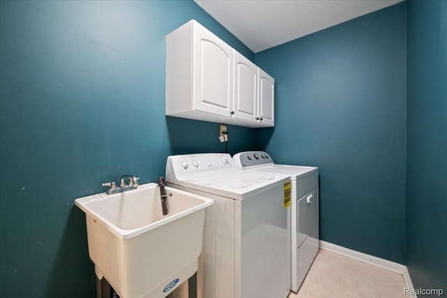 4632 Hunters Cir W, Canton, MI 48188 - laundry room with separate washer and dryer, cabinet space, and baseboards