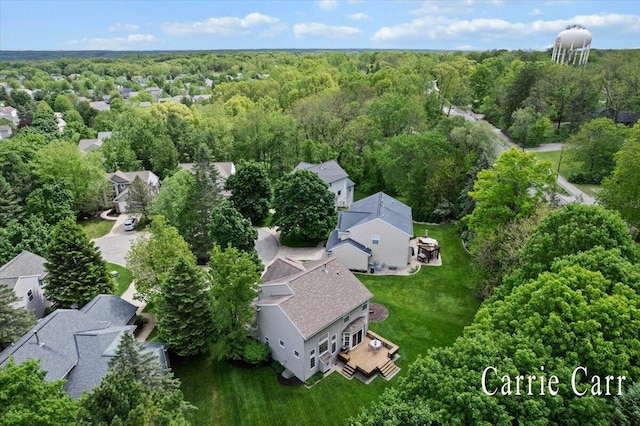 745 Abbey Mill Ct SE, Ada, MI 49301 - aerial perspective of suburban area featuring a heavily wooded area