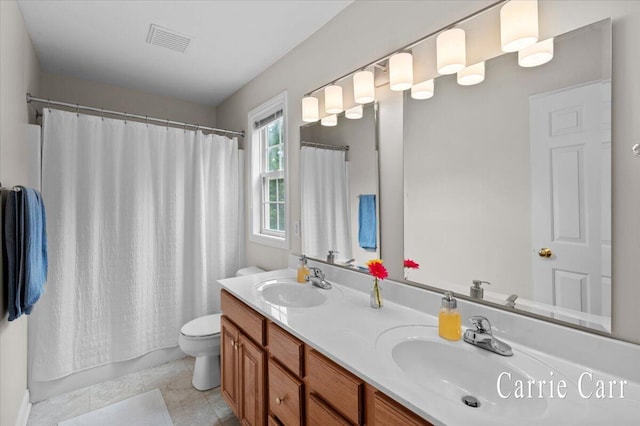 745 Abbey Mill Ct SE, Ada, MI 49301 - bathroom with toilet and double vanity
