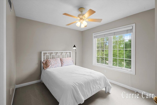 745 Abbey Mill Ct SE, Ada, MI 49301 - carpeted bedroom with baseboards and a ceiling fan