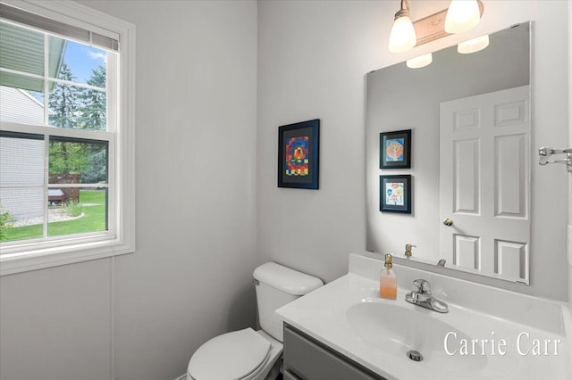 745 Abbey Mill Ct SE, Ada, MI 49301 - half bathroom with vanity and toilet
