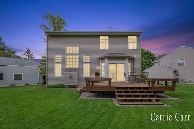 745 Abbey Mill Ct SE, Ada, MI 49301 - back of property at dusk featuring a deck, a lawn, and central air condition unit