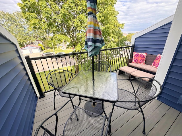 261 Black River St Unit F, South Haven, MI 49090 - wooden terrace featuring outdoor dining space