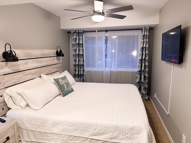 261 Black River St Unit F, South Haven, MI 49090 - bedroom with baseboards and ceiling fan