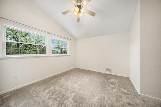647 Church St, Grass Lake, MI 49240 - unfurnished room featuring lofted ceiling, carpet floors, ceiling fan, and baseboards