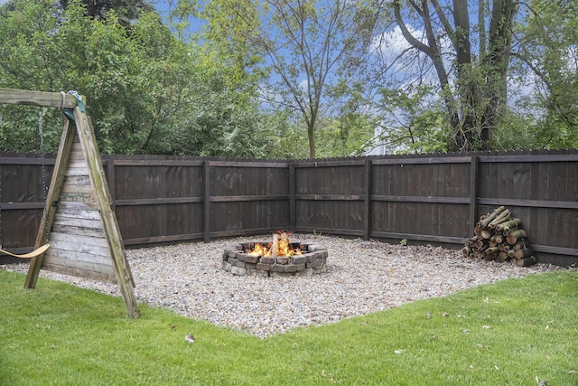 647 Church St, Grass Lake, MI 49240 - view of yard featuring an outdoor fire pit