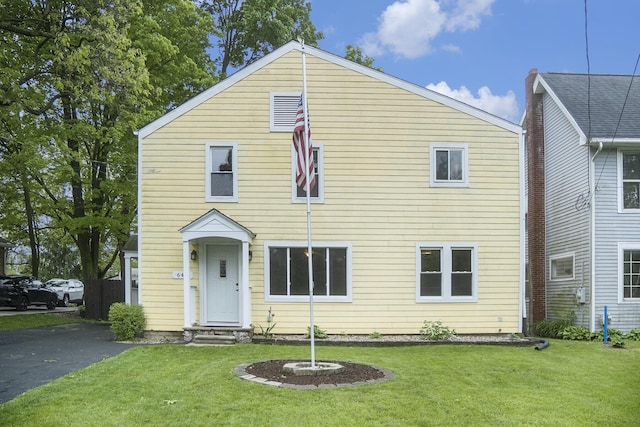 647 Church St, Grass Lake, MI 49240 - view of front facade with a front yard