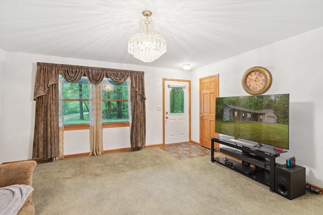 37965 County Road 388, Gobles, MI 49055 - carpeted living area with a chandelier and baseboards