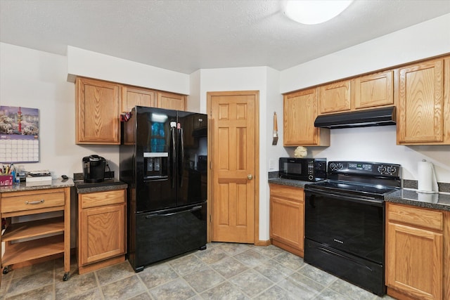 37965 County Road 388, Gobles, MI 49055 - kitchen featuring black appliances, under cabinet range hood, and dark stone countertops