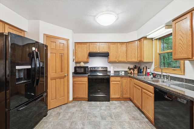 37965 County Road 388, Gobles, MI 49055 - kitchen with black appliances, a sink, dark countertops, range hood, and a textured ceiling