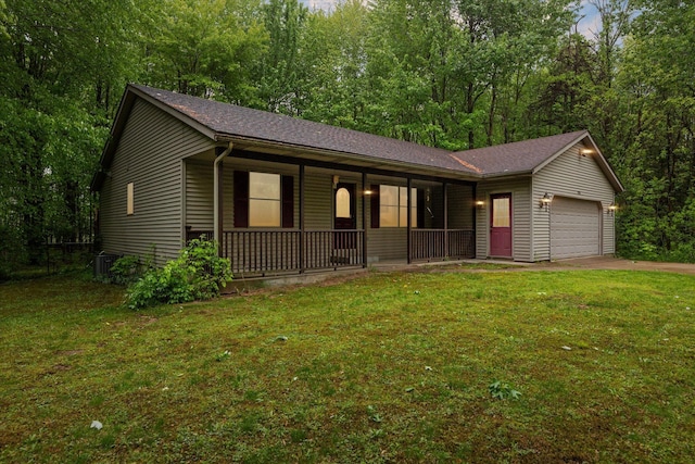 37965 County Road 388, Gobles, MI 49055 - ranch-style house with a porch, a garage, a front lawn, driveway, and central air condition unit