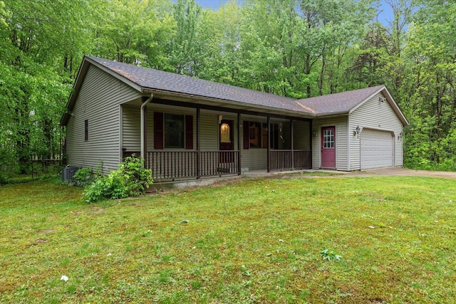 37965 County Road 388, Gobles, MI 49055 - single story home with covered porch, a garage, a front yard, and driveway