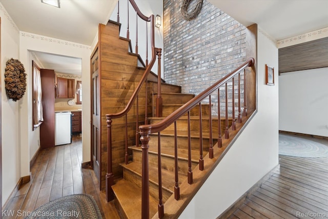 2095 E Nalone, Wixom, MI 48393 - staircase featuring hardwood / wood-style flooring, baseboards, and healthy amount of natural light