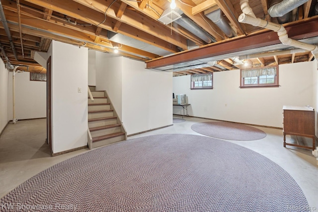 2095 E Nalone, Wixom, MI 48393 - below grade area featuring stairs and baseboards