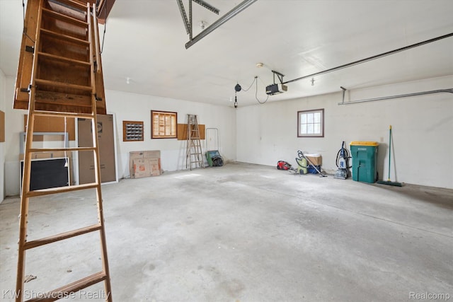 2095 E Nalone, Wixom, MI 48393 - garage featuring a garage door opener