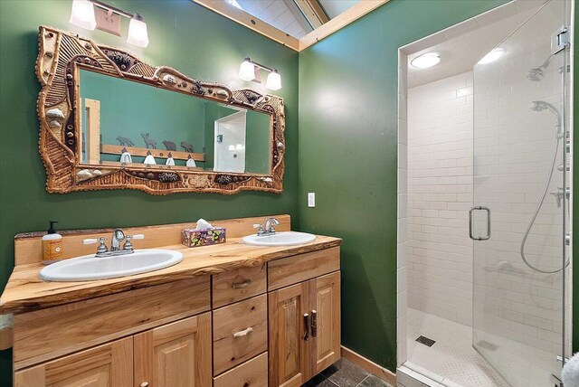 5765 Wildwood Dr, Bridgman, MI 49106 - bathroom with a shower stall and double vanity