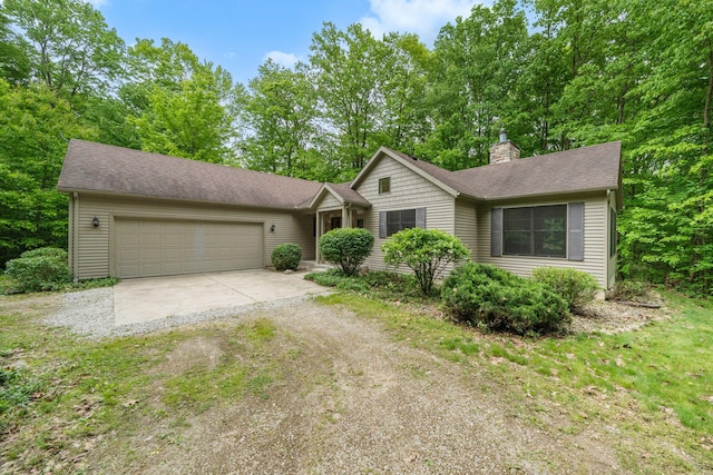 64711 Shorewood Ln, Cassopolis, MI 49031 - single story home featuring driveway, a chimney, an attached garage, and a shingled roof
