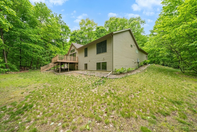 64711 Shorewood Ln, Cassopolis, MI 49031 - rear view of house with a wooden deck and a yard