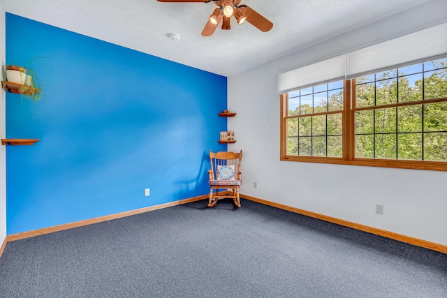 6248 Black Forest Trl, Muskegon, MI 49442 - carpeted empty room with baseboards, ceiling fan, and a smoke detector