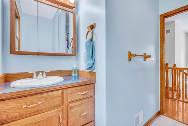 6248 Black Forest Trl, Muskegon, MI 49442 - bathroom featuring vanity and tile patterned flooring