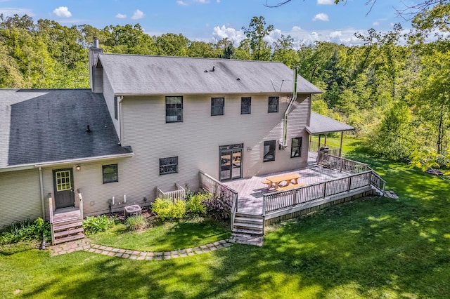 6248 Black Forest Trl, Muskegon, MI 49442 - rear view of property featuring a yard, a chimney, a wooden deck, and a shingled roof