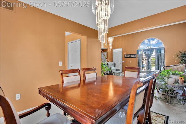 19298 Mitchell St, Rockwood, MI 48173 - dining room with a chandelier and stairs