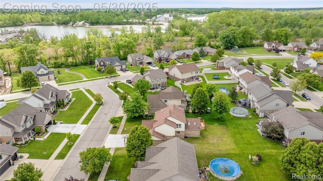 19298 Mitchell St, Rockwood, MI 48173 - aerial perspective of suburban area featuring a nearby body of water