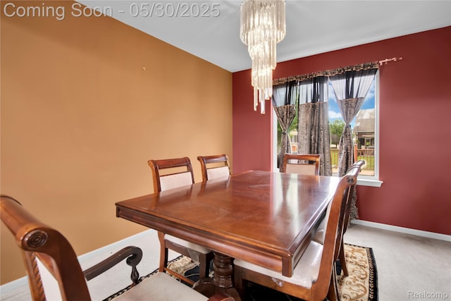 19298 Mitchell St, Rockwood, MI 48173 - carpeted dining space featuring a chandelier and baseboards
