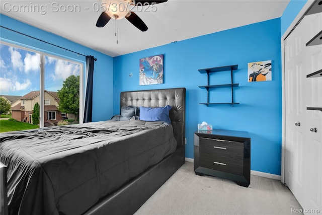 19298 Mitchell St, Rockwood, MI 48173 - carpeted bedroom with baseboards and a ceiling fan