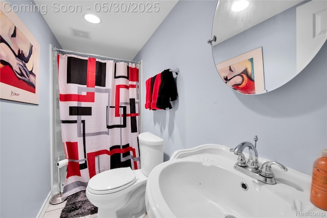 19298 Mitchell St, Rockwood, MI 48173 - full bath featuring a sink, toilet, curtained shower, tile patterned floors, and baseboards