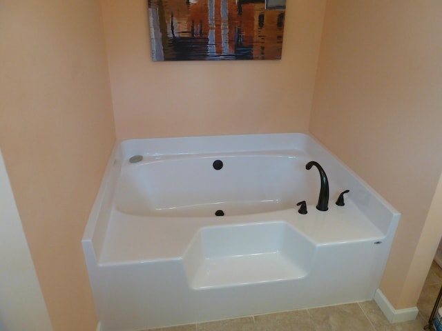 317 Monroe St, South Haven, MI 49090 - full bathroom featuring a bath and tile patterned floors