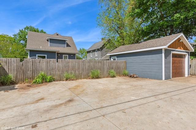 1310 Harrison Ave, Saint Joseph, MI 49085 - view of patio with an outbuilding and a detached garage