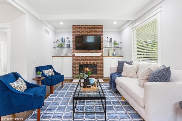 1310 Harrison Ave, Saint Joseph, MI 49085 - living area featuring wood finished floors, a fireplace, beamed ceiling, and recessed lighting